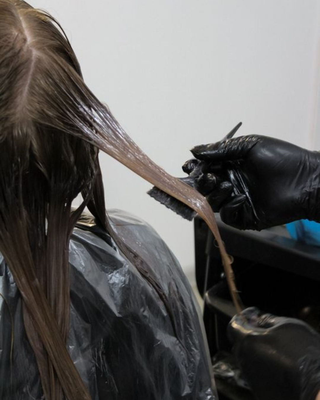 Keratin smoothing treatment in salon for shiny, straight hair
