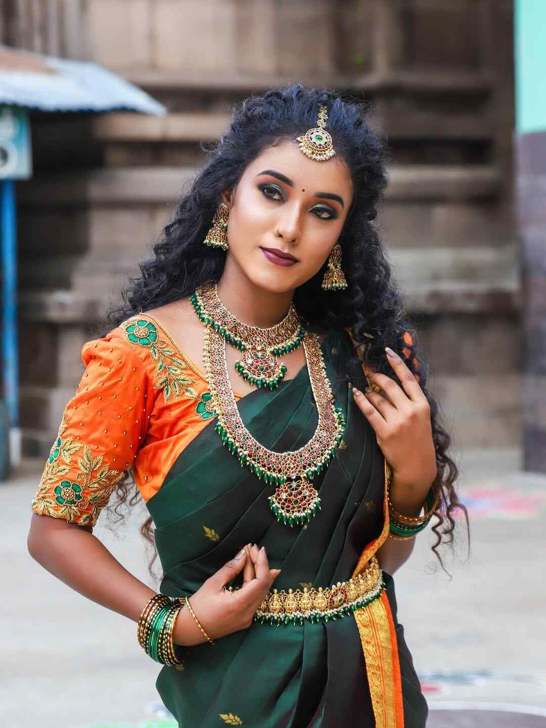 image of South Indian bride with traditional bridal makeup and temple jewelry in Singampunari